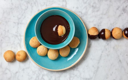 Baked dough balls with chocolate dipping sauce
