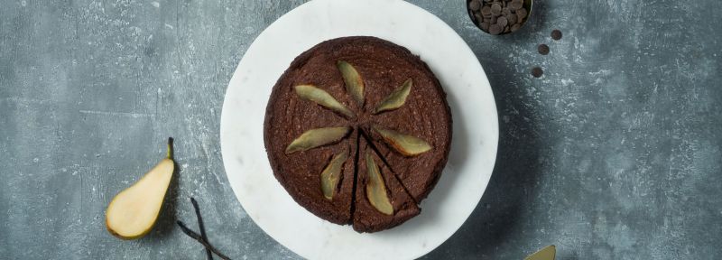 Flourless chocolate cake with poached vanilla pear