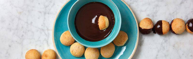 Baked dough balls with chocolate dipping sauce