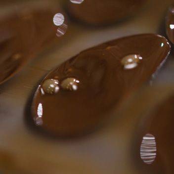 Pull off the excess chocolate