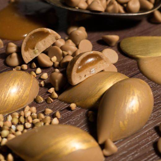 Golden macadamia, caramel & buckwheat praline