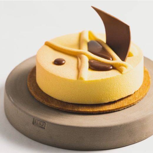 White and Milk Chocolate Tart with Bananas, Coconut and Passion Fruit