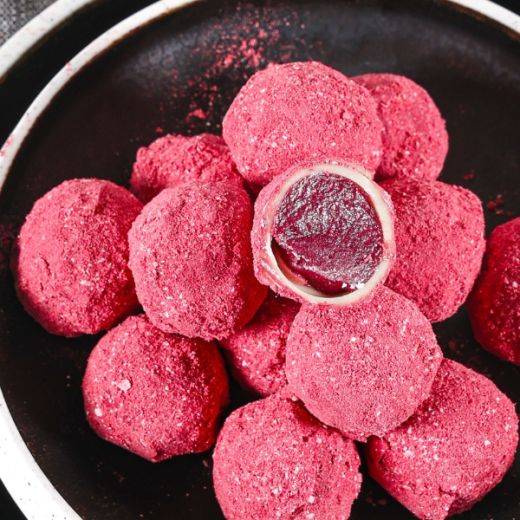 WHITE CHOCOLATE TRUFFLE SHELLS FILLED WITH RUBY & RASPBERRY CARAMEL